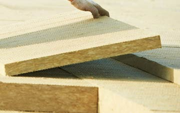 measuring Huxham Green tapered insulation